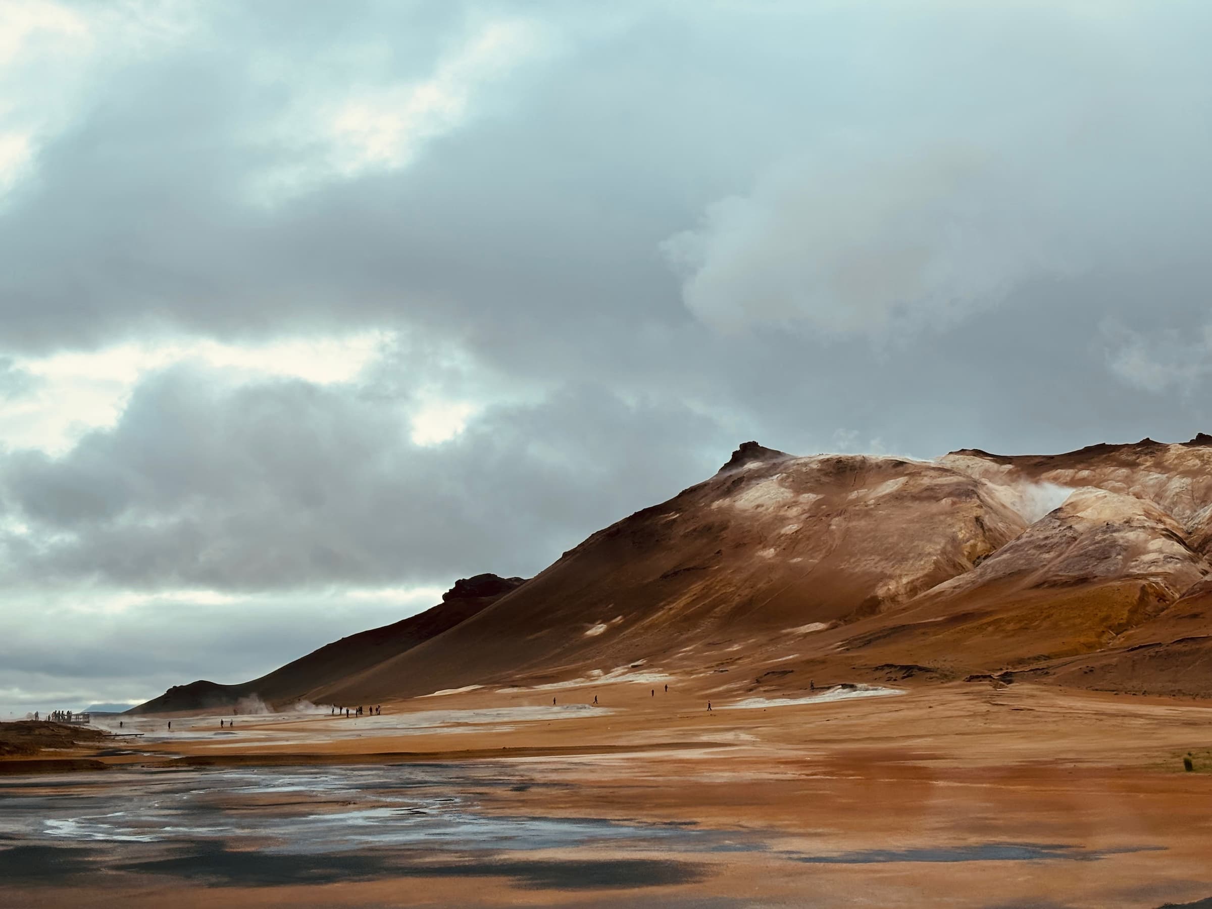 Views of Myvatn Geothermal Area near Akureyri, Iceland. Mountains and wilderness under a cloudy sky.