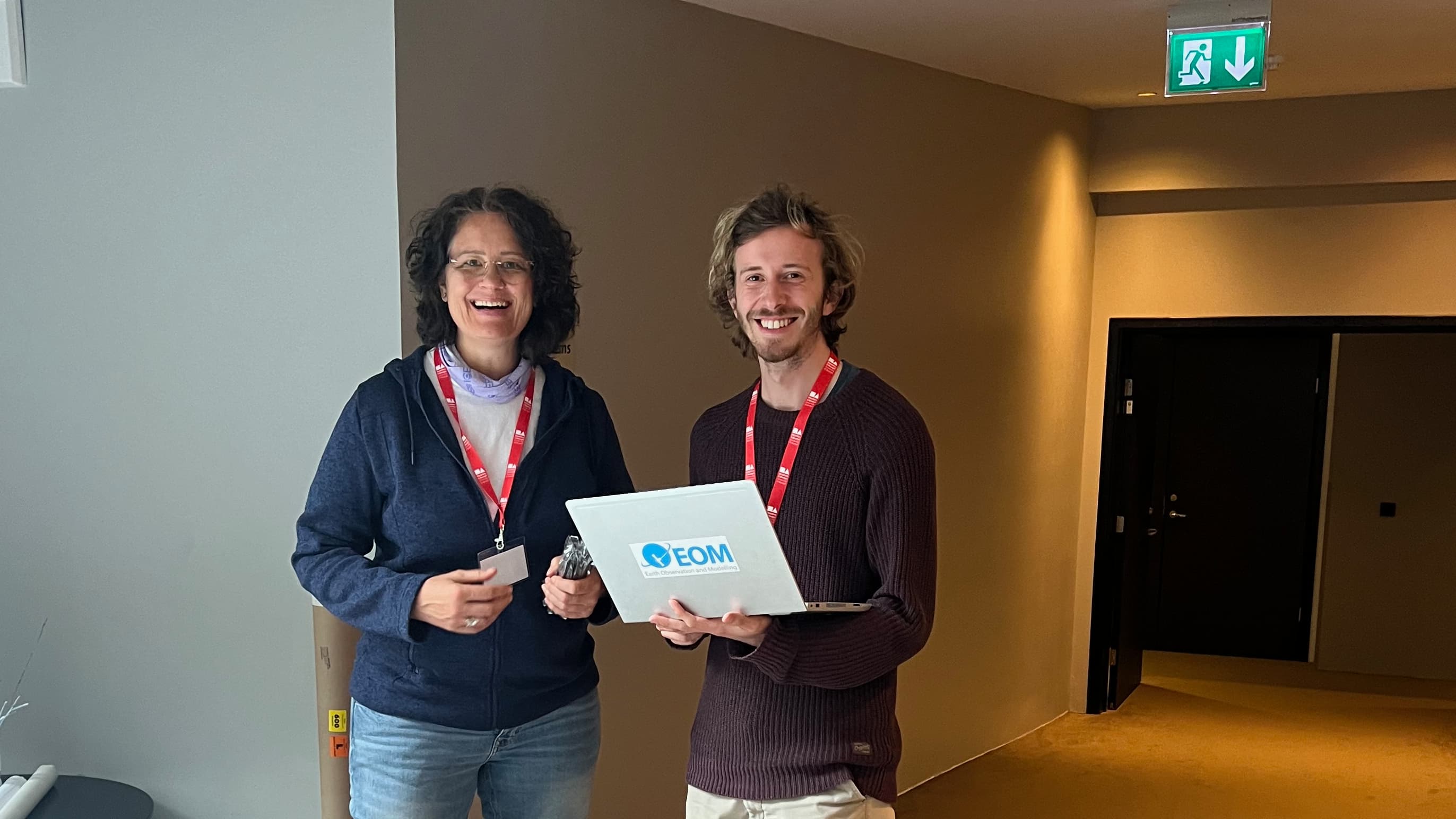Natascha Oppelt and Victor Lion look at the camera and smile.