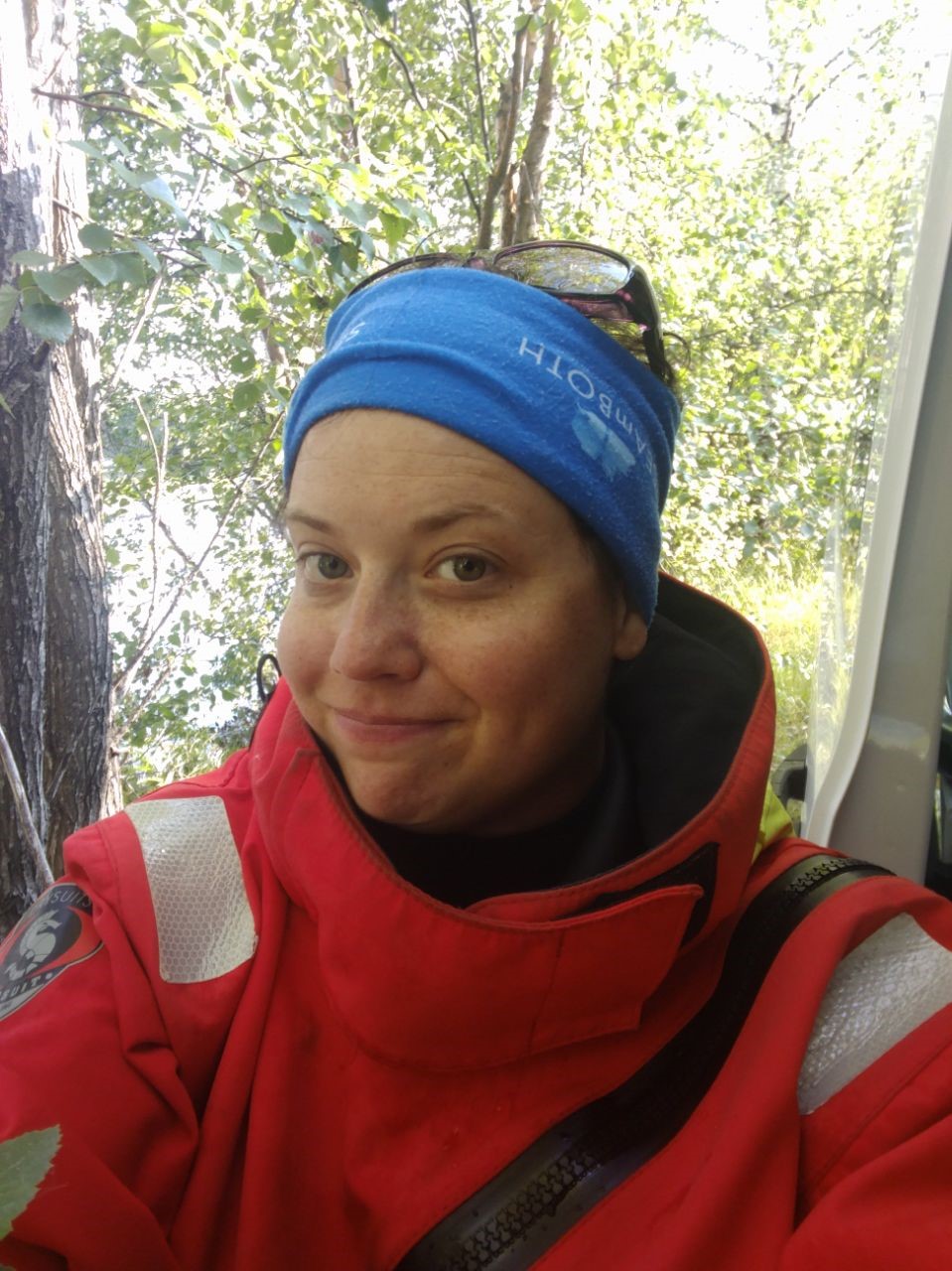 In a selfie image, Ashley Gipson looks at the camera wearing outdoor clothing.